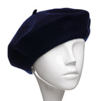 Bereta damă franțuzească pe culoarea bleumarin.