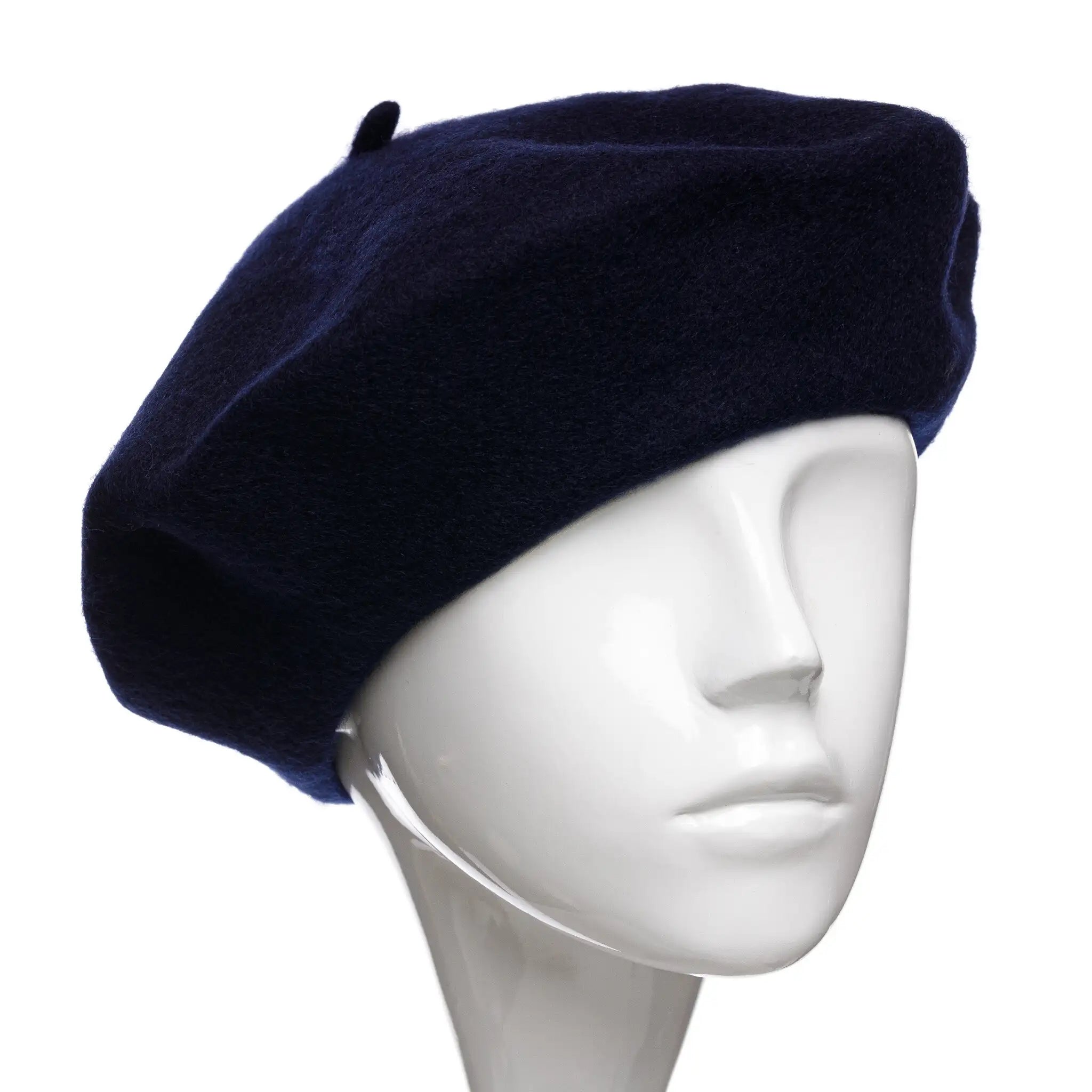 Bereta damă franțuzească din lână pe culoarea bleumarin.