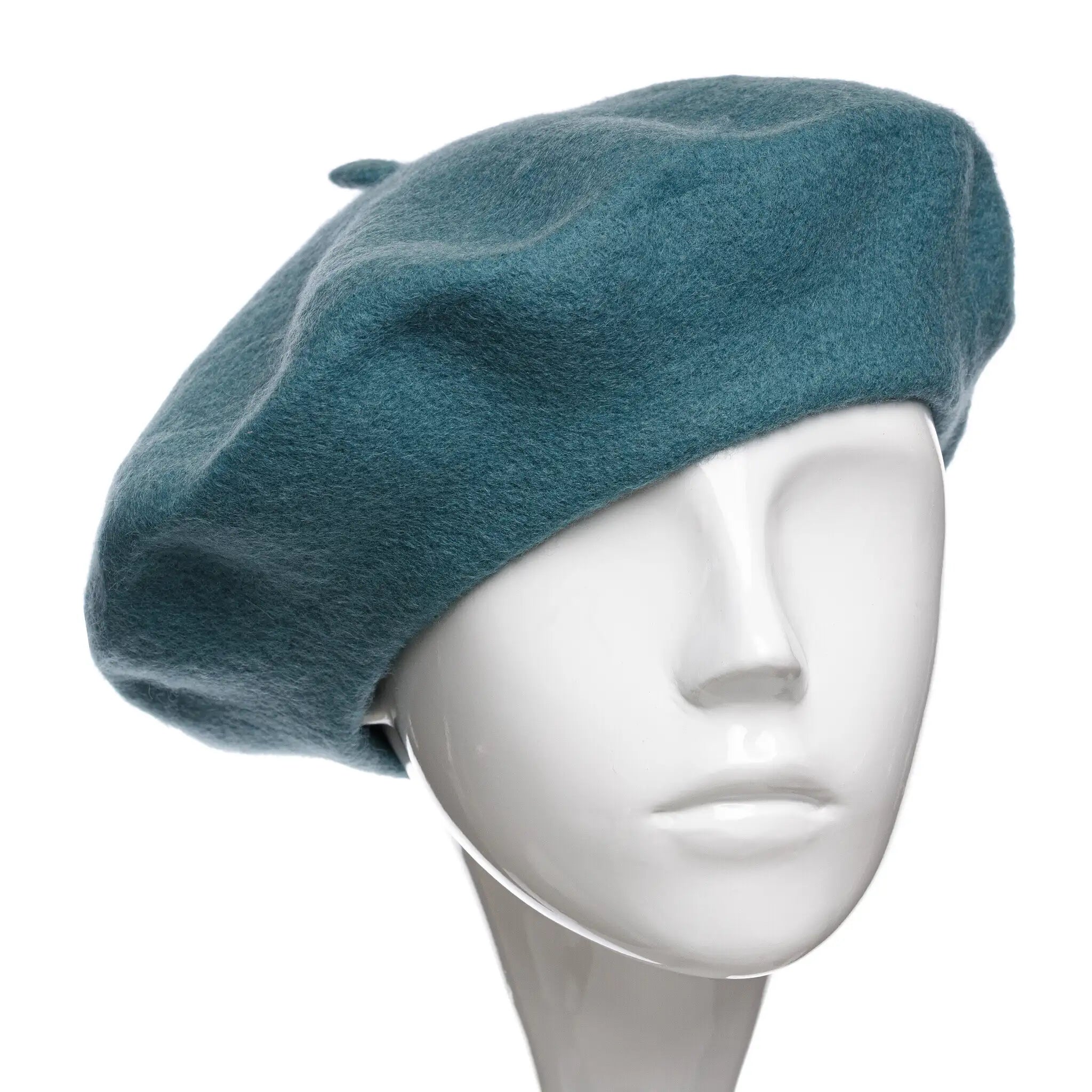 Bereta damă franțuzească din lână pe culoarea verde ou de rață.