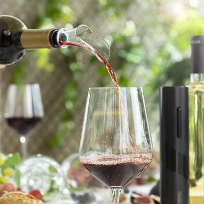Tirbuson electric si accesorii pentru vinul este servit prin aerator, imbunatatind aroma.